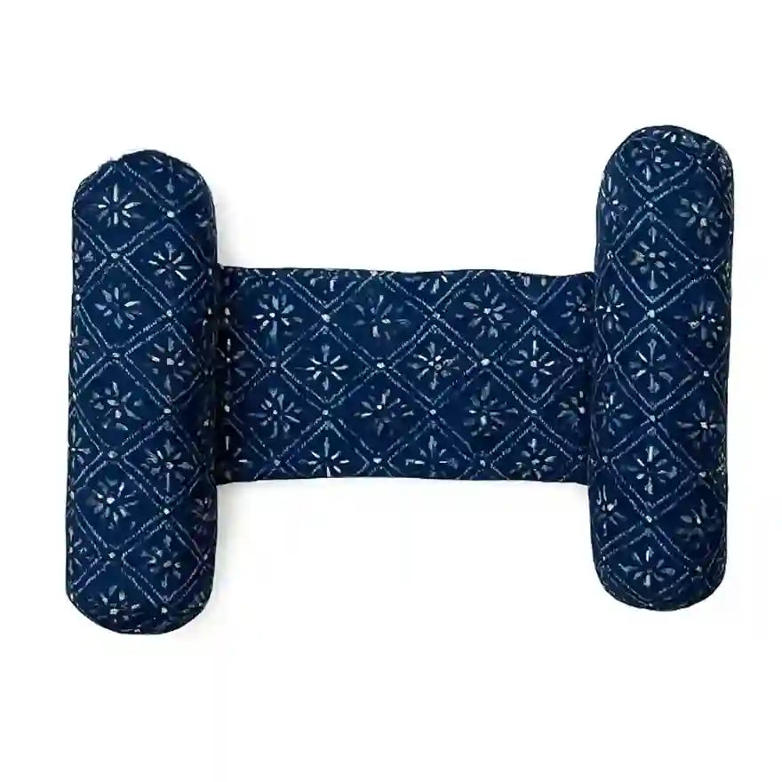 Blue patterned headrest pillow on a white background