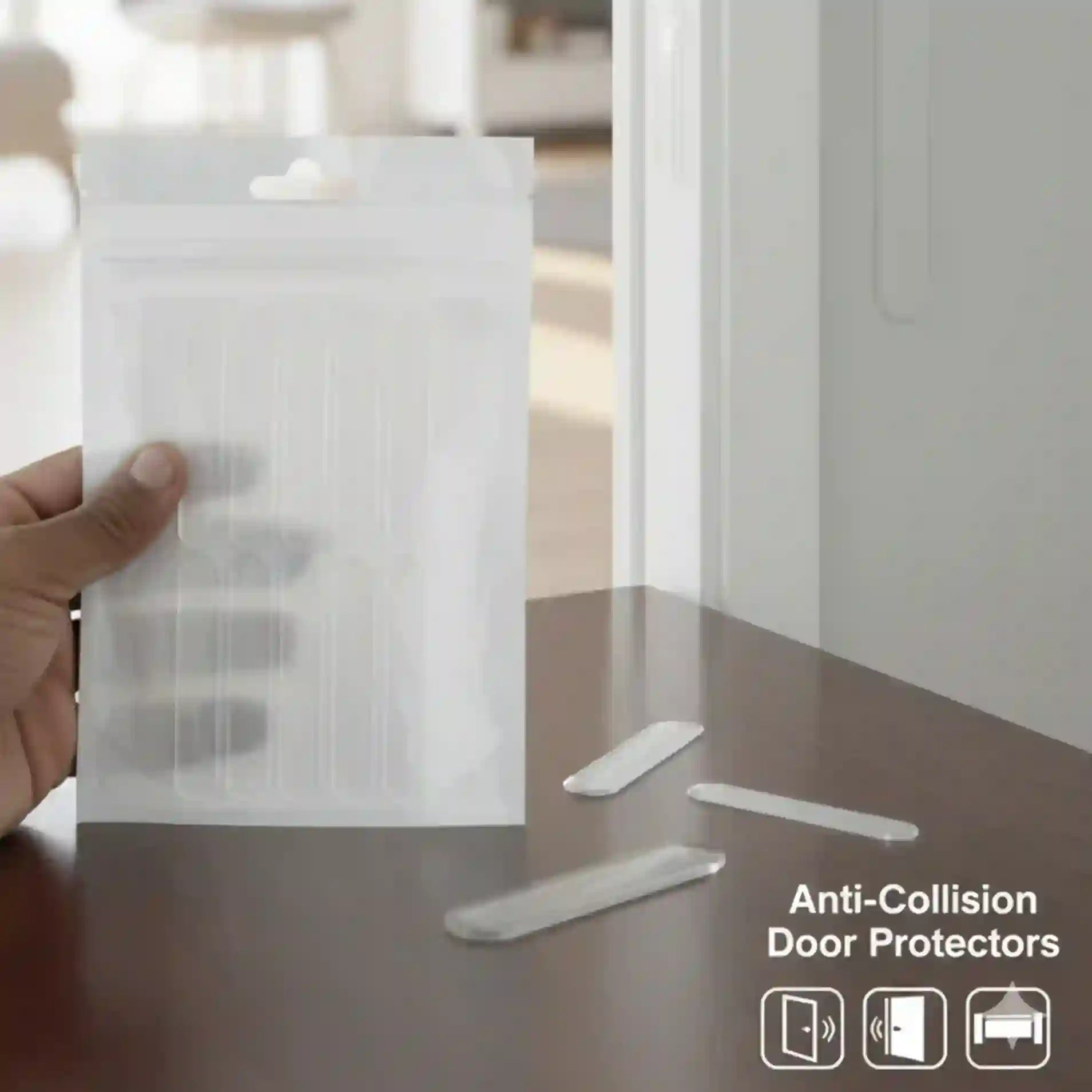 Hand holding a package of anti-collision door protectors on a table.