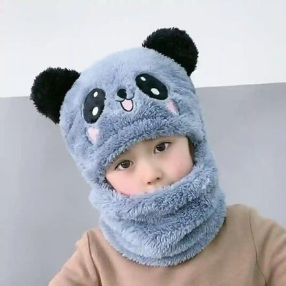 Child wearing a blue panda-themed hood and scarf on a plain background