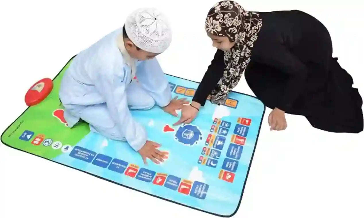 Two children interacting with an educational mat on a white background