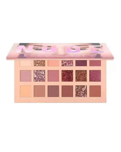 Makeup palette with various shades on a white background