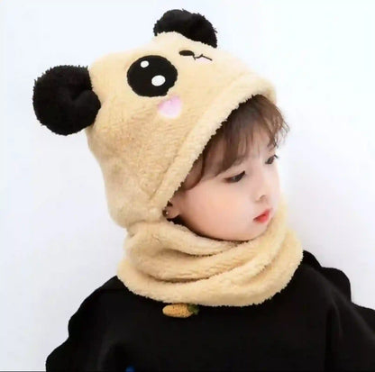 Child wearing a beige hood with panda ears on a white background