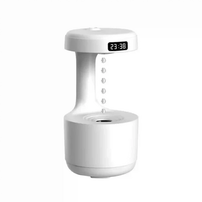 White electronic device with digital display on a white background