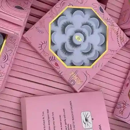 Pink packaging of false eyelashes with floral design