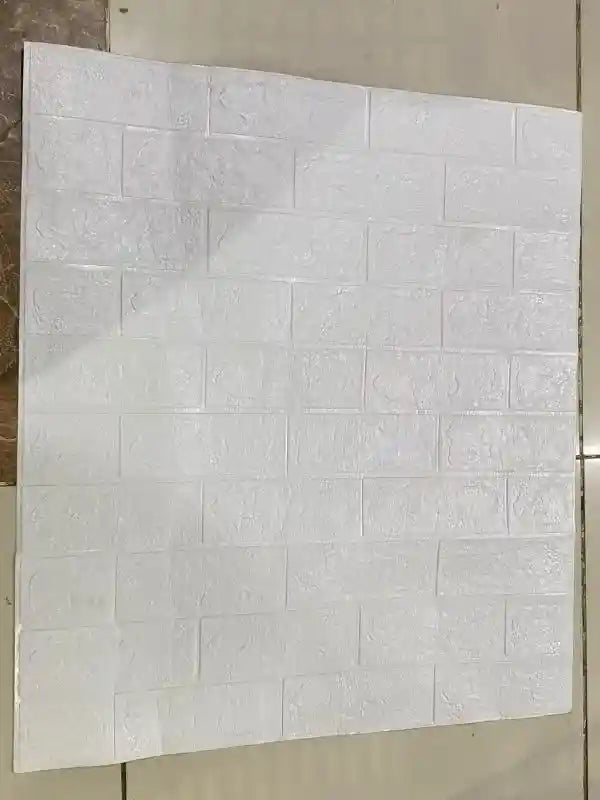 White tiled wall panel on a gray background