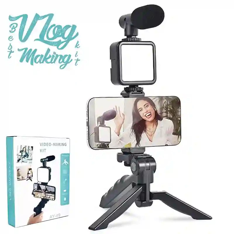 Video-making kit with smartphone holder, microphone, and stand on a white background