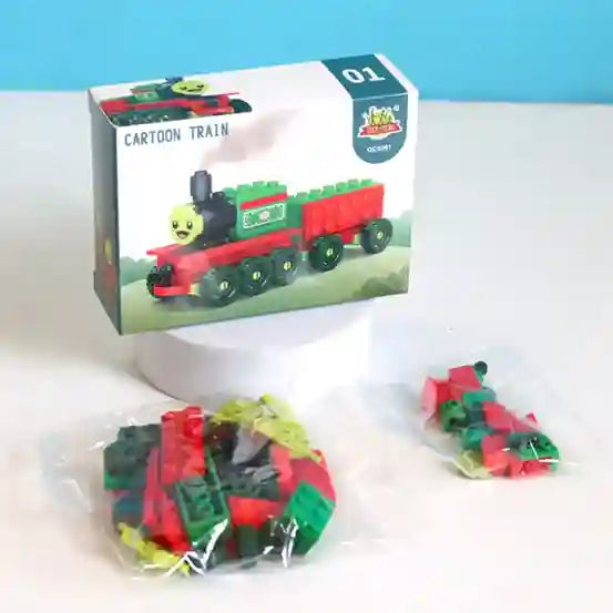 Toy train set with packaging on a white surface