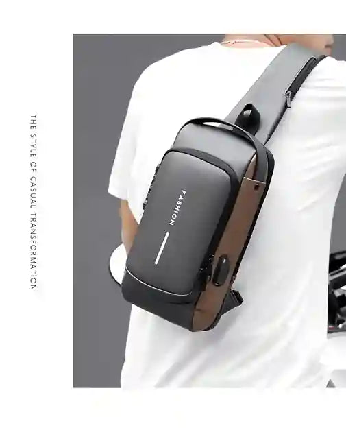 Person wearing a gray crossbody bag with 'FASHION' branding on a plain background