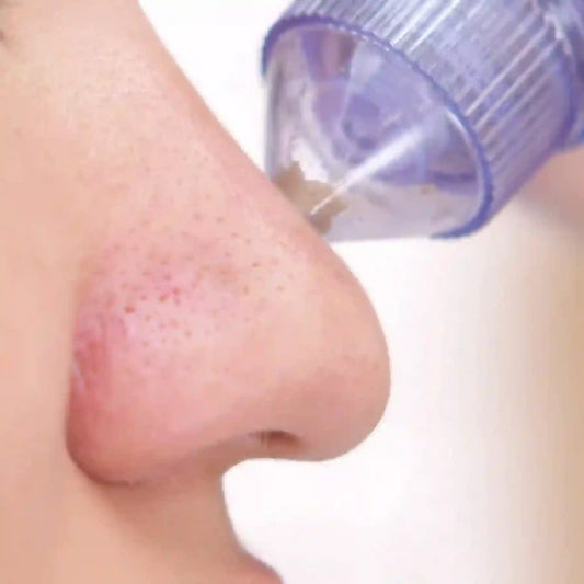 Nose with a small amount of liquid on it, close-up