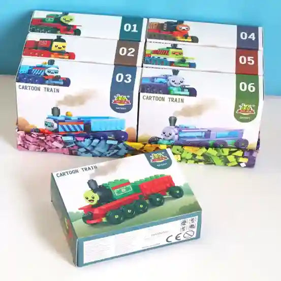 Cartoon train toy set with packaging on a white surface