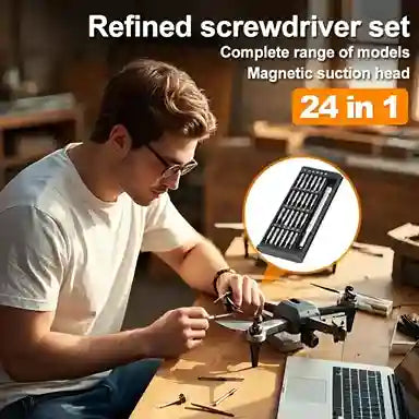 Person using a 24-in-1 screwdriver set in a workshop setting