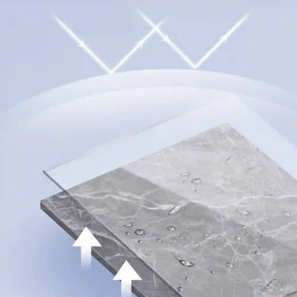 Close-up of a marble surface with water droplets and arrows indicating water movement.