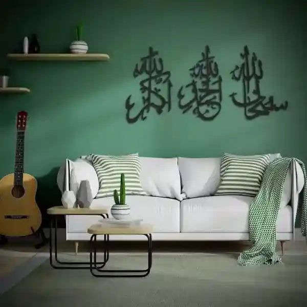 Living room with a green wall, white sofa, and decorative elements.