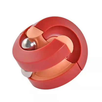 Red and orange puzzle toy with a silver ball on a white background