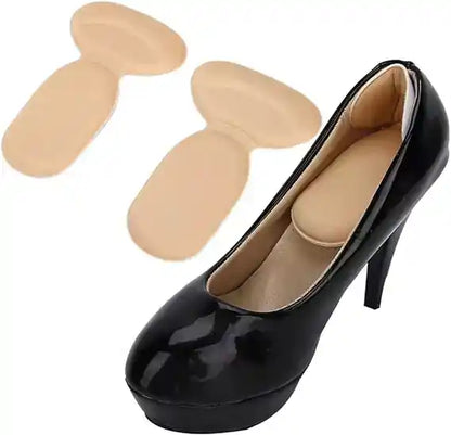 Black high-heeled shoe with beige shoe inserts on a white background