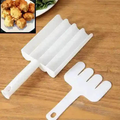 White silicone mold for making cylindrical shapes on a wooden surface, with a close-up inset of fried food.