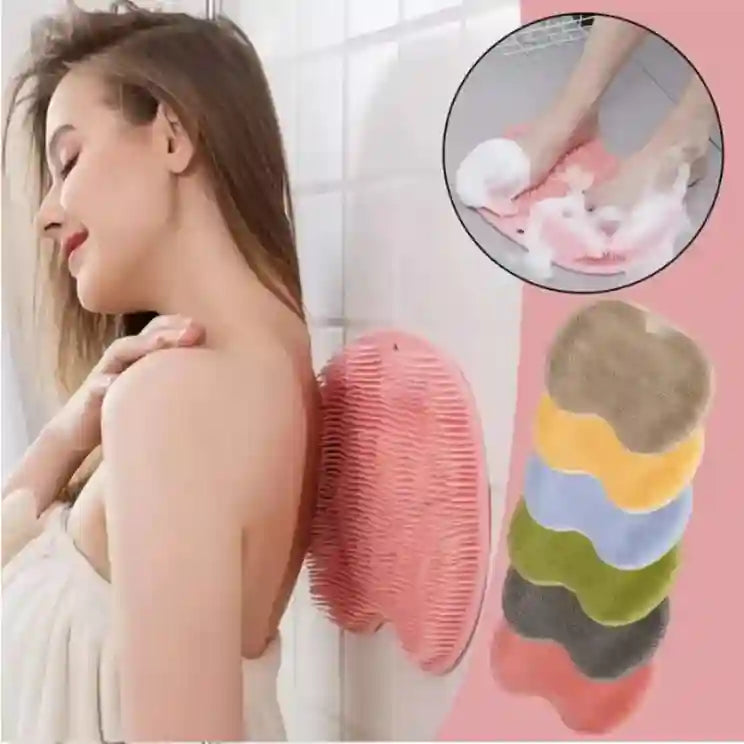 Woman using a pink scrubber on her back with inset showing close-up of scrubber in use.