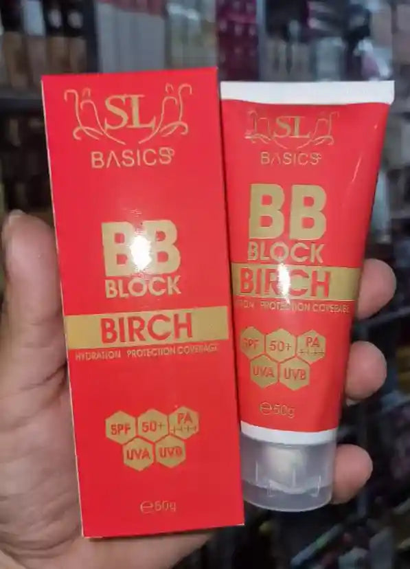 SL Basics BB Block Birch cream and box held by a hand