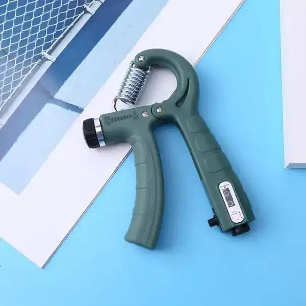 Green hand grip trainer on a blue and white geometric background