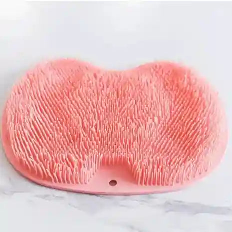 Pink textured heart-shaped object on a white background