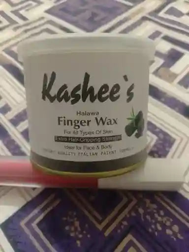 Jar of Kashee's Halawa Finger Wax on a patterned surface