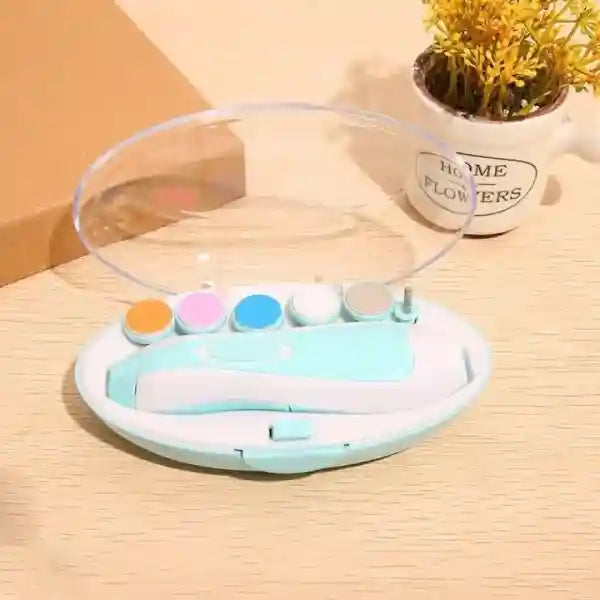Small electronic device with colorful buttons on a wooden surface