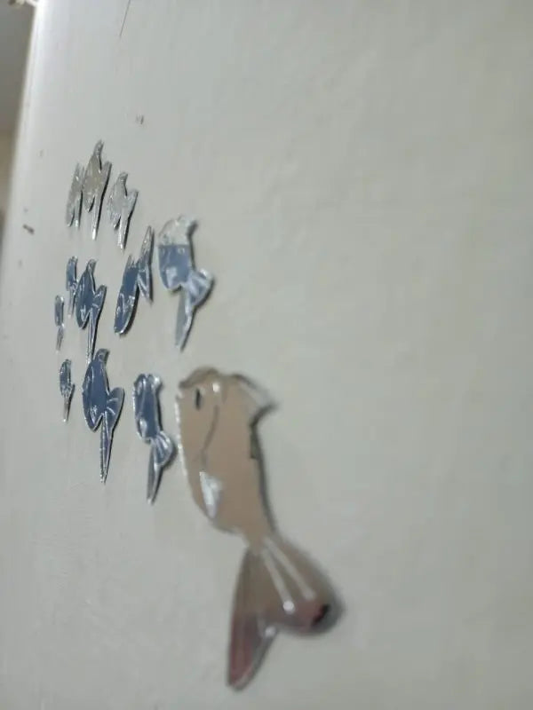 Metallic decorative elements on a plain background