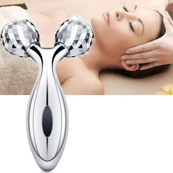 Beauty roller device with a blurred background of a person using it on their face.