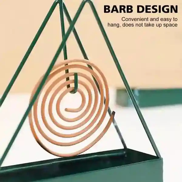 Coil of copper wire on a green stand with 'Barb Design' text