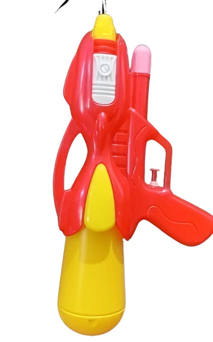 Red and yellow toy gun on a white background