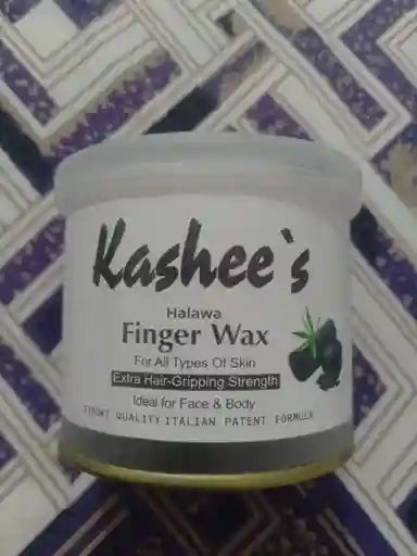 Kashee's Finger Wax container on a patterned background