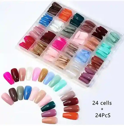Set of nail extensions in various colors with a clear display case.