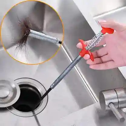 Person using a drain cleaning tool to clear a clogged sink drain.