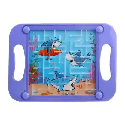 Shark-themed puzzle with magnetic pieces on a purple board