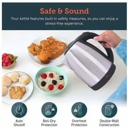 Electric kettle with safety features displayed on a table with food.