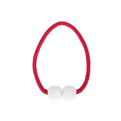 Red hair tie with white beads on a white background