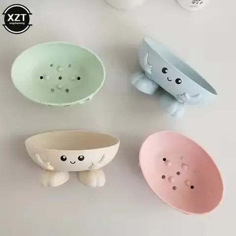 Set of four cute ceramic bowls in different colors on a white background with 'XZT' branding.