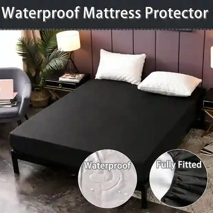 Black waterproof mattress protector on a bed with room decor.