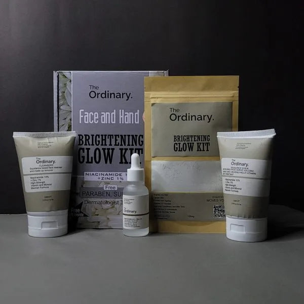 The Ordinary skincare products including cream tubes and a box on a dark background