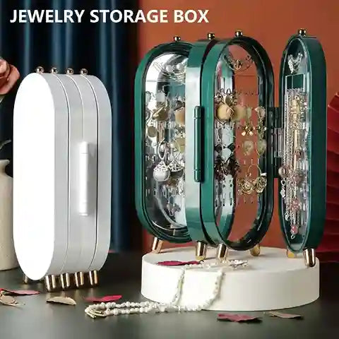 Jewelry storage box with jewelry inside on a dark surface