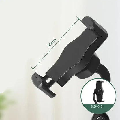 Black phone holder with measurement details on a light background