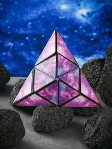 Triangular pyramid light with a purple and pink gradient on a dark, textured surface with a blue starry sky background.