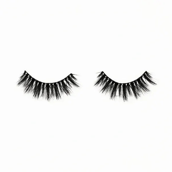 Pair of black false eyelashes on a white background