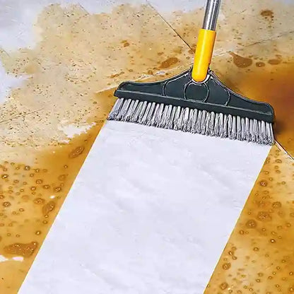 Cleaning brush being used on a stained floor