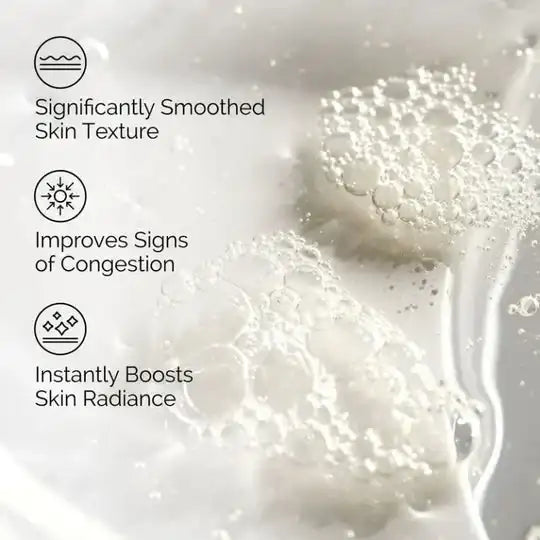 Close-up of skincare product with text highlighting benefits on a light background