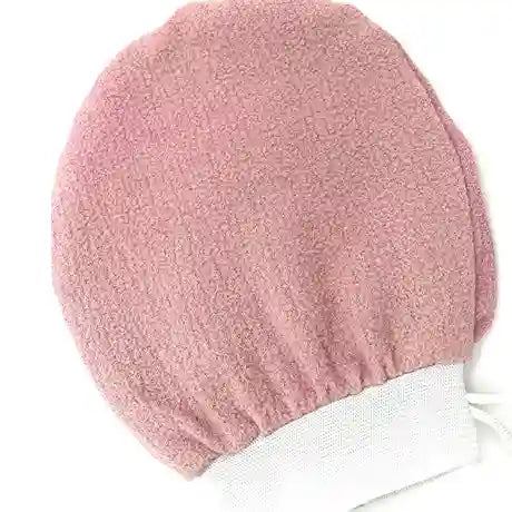 Pink scrubber with white handle on a white background