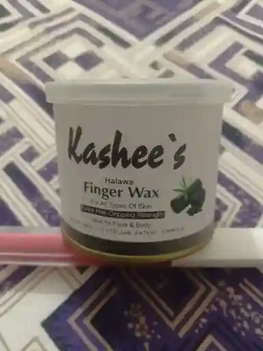 Kashee's Finger Wax container on a patterned surface