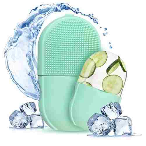 Mint green facial cleansing brush with cucumber slices and ice cubes on a white background