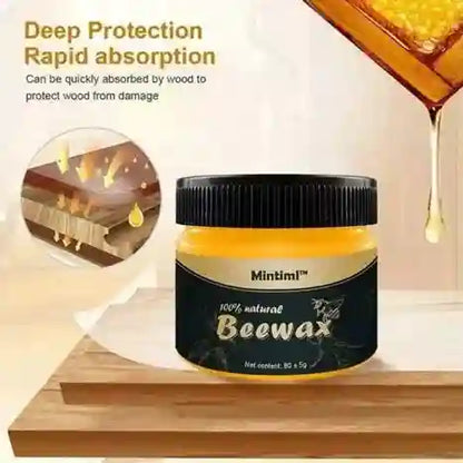 Jar of Mintiml Beewax with wooden background and honeycomb