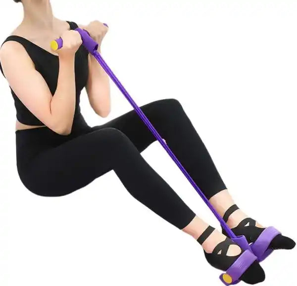 Person using a purple resistance band for leg exercise on a white background